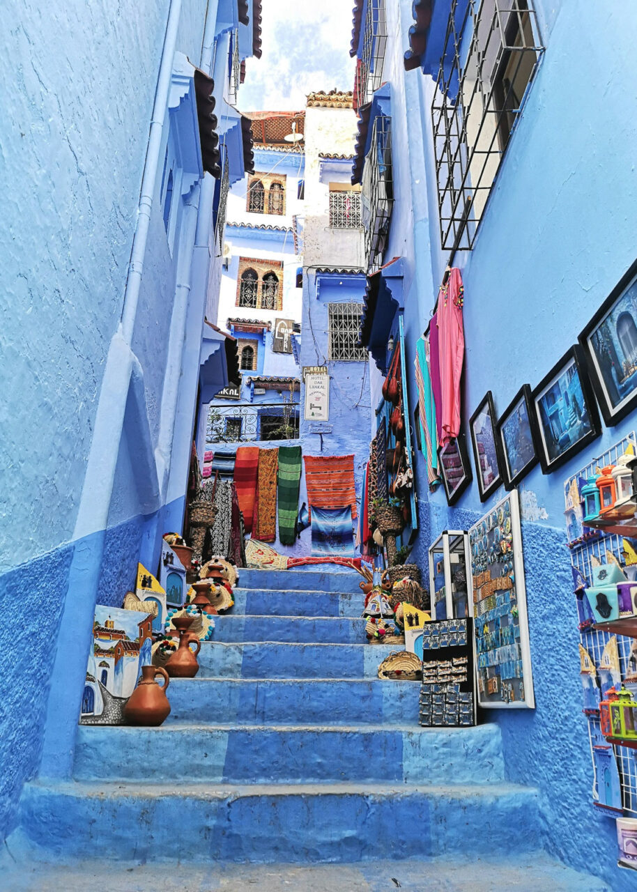 Art and souvenirs on a blue staircase in Chefchaouen 